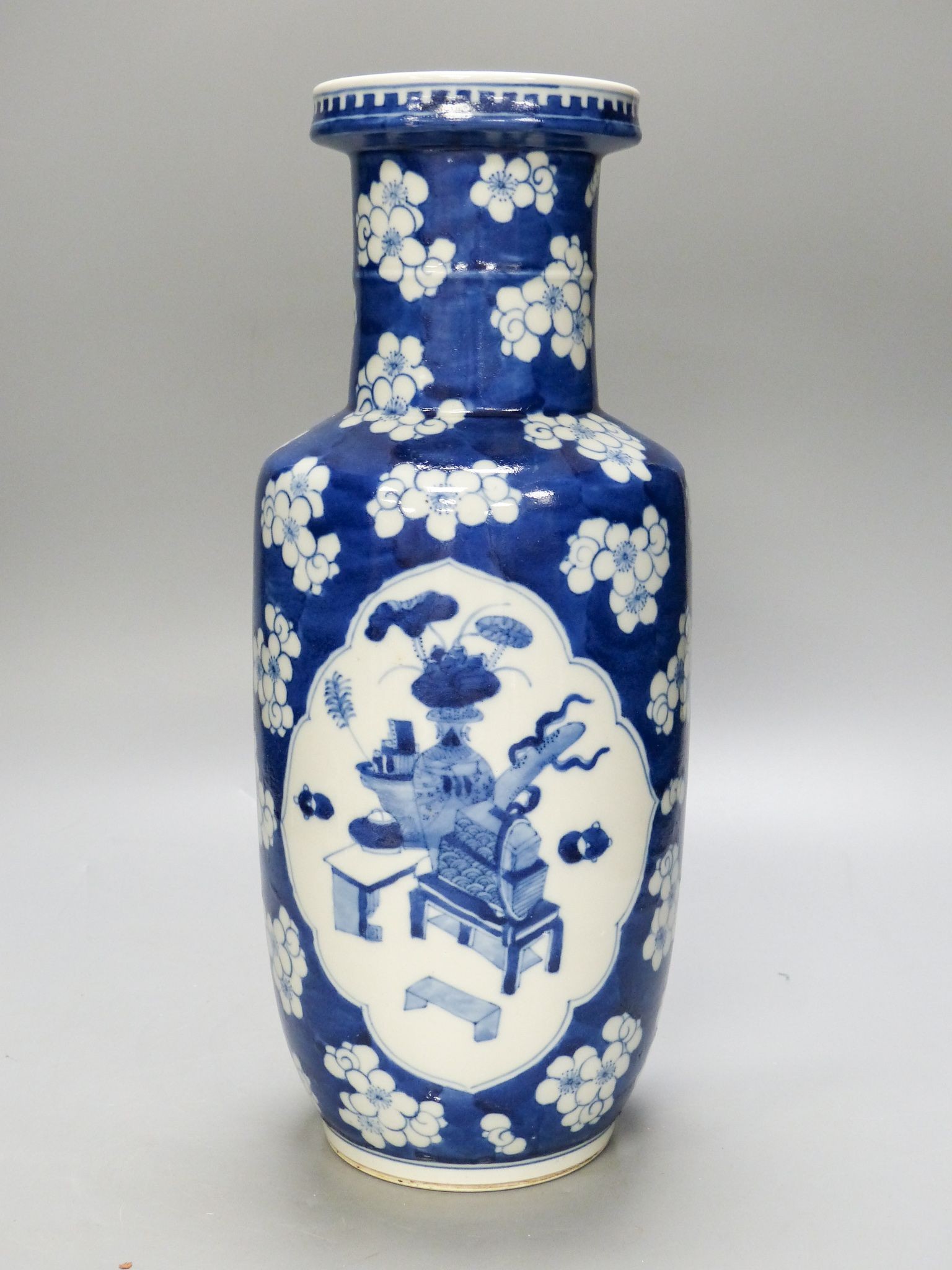 A Chinese blue and white ‘prunus’ rouleau vase, 35cm